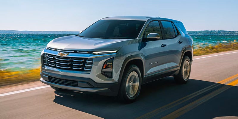 2026 Chevrolet Equinox Driving Down Highway Along Waterside